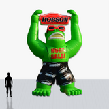 Custom 25 foot inflatable rooftop green gorilla with glasses and shorts