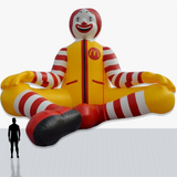 Custom 25 Foot Clown Inflatable with company logo and colors