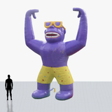 Custom 25 foot inflatable rooftop purple gorilla with shorts and glasses